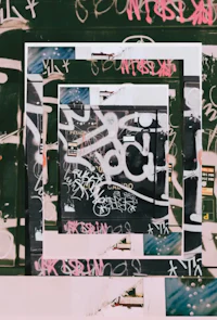 a photo of a graffiti covered wall in a square frame