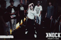 a group of people standing in a dark room